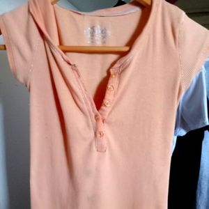 A cute peach color button up pj top